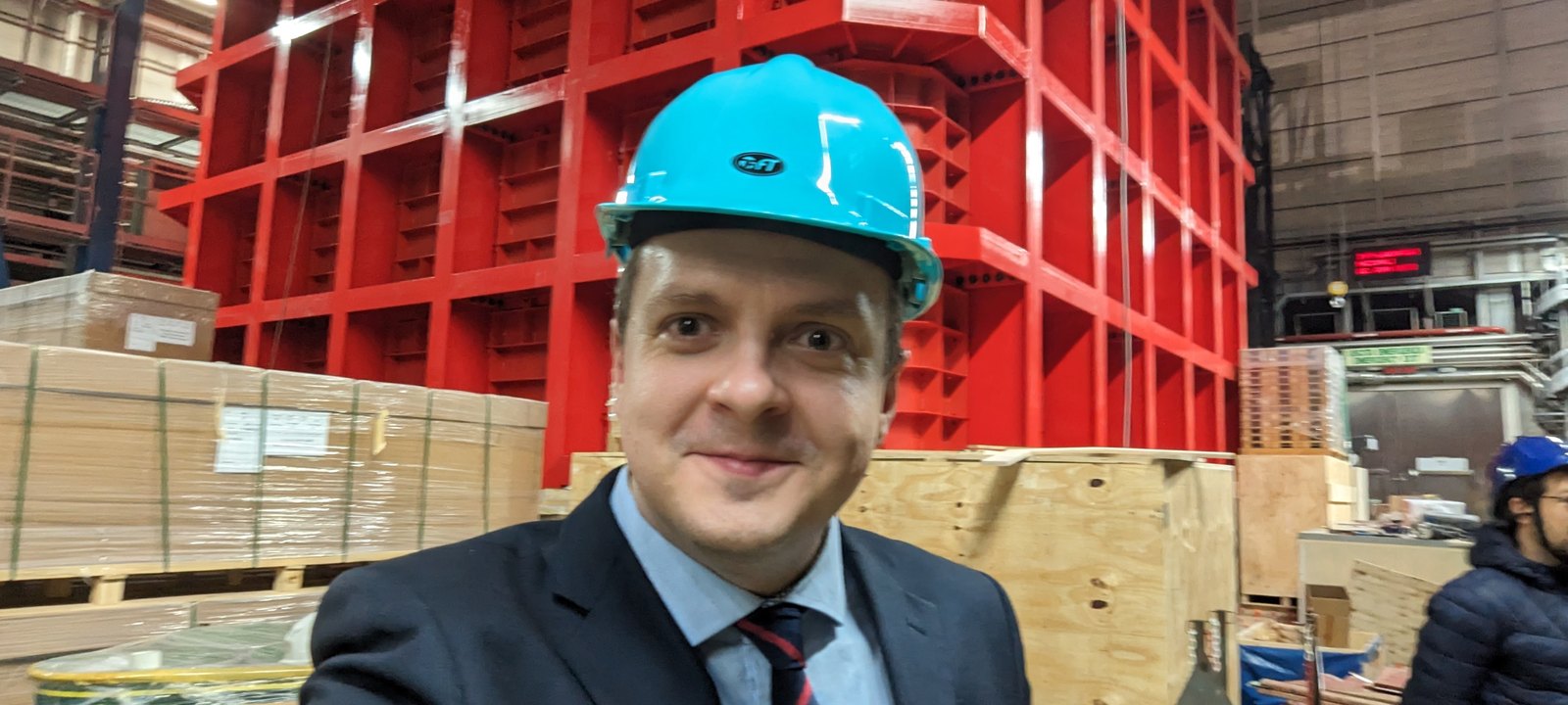 Darren in front of the DarkSide-20k veto vessel during assembly